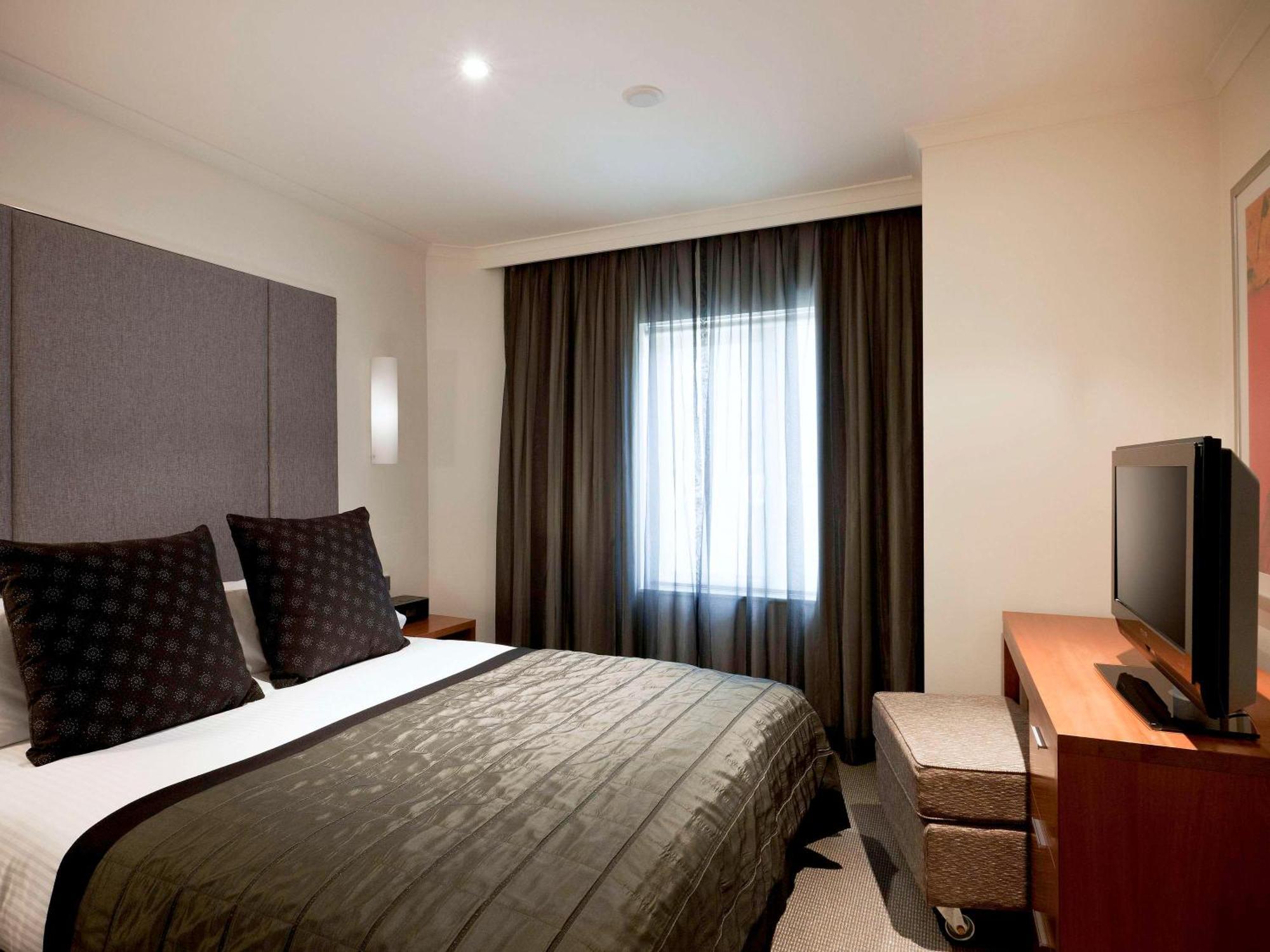 The Sebel Quay West Suites Sidney Dış mekan fotoğraf A bedroom at the hotel